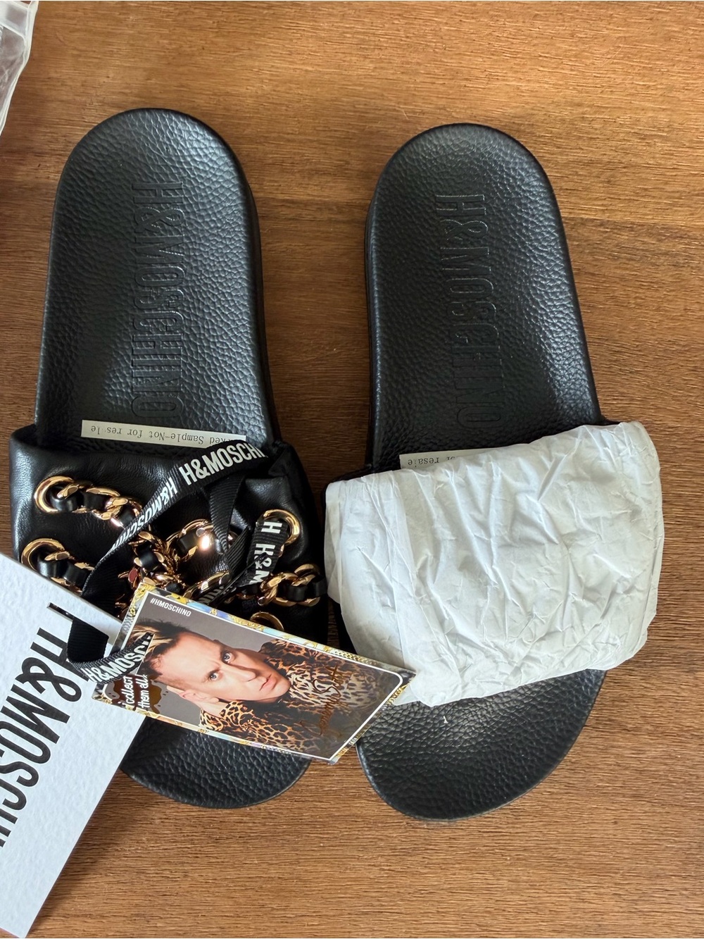 Moschino Black Slide Sandals with Gold Chain Accent